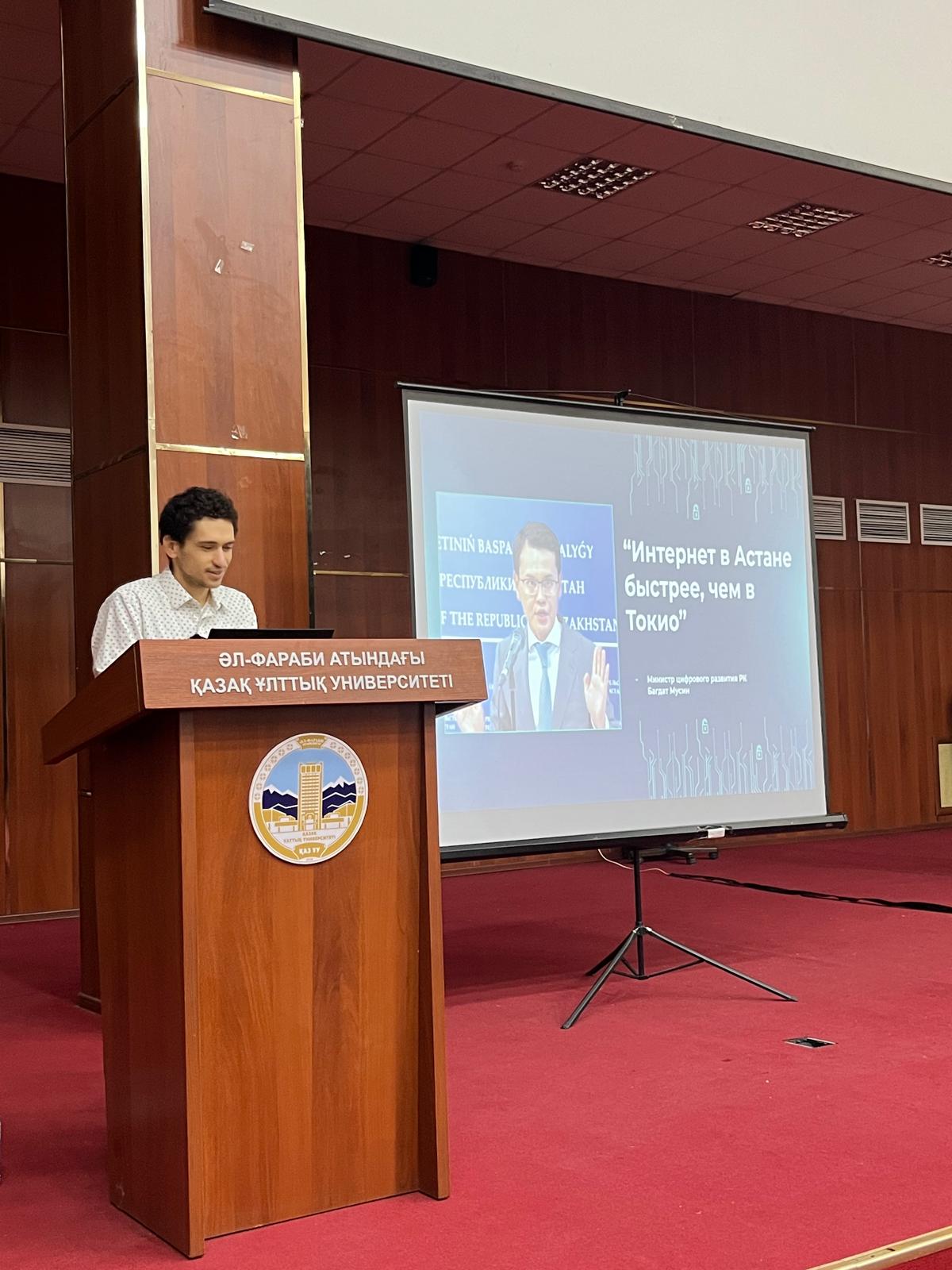 Giving a presentation in Russian at Al-Farabi Kazakh National University