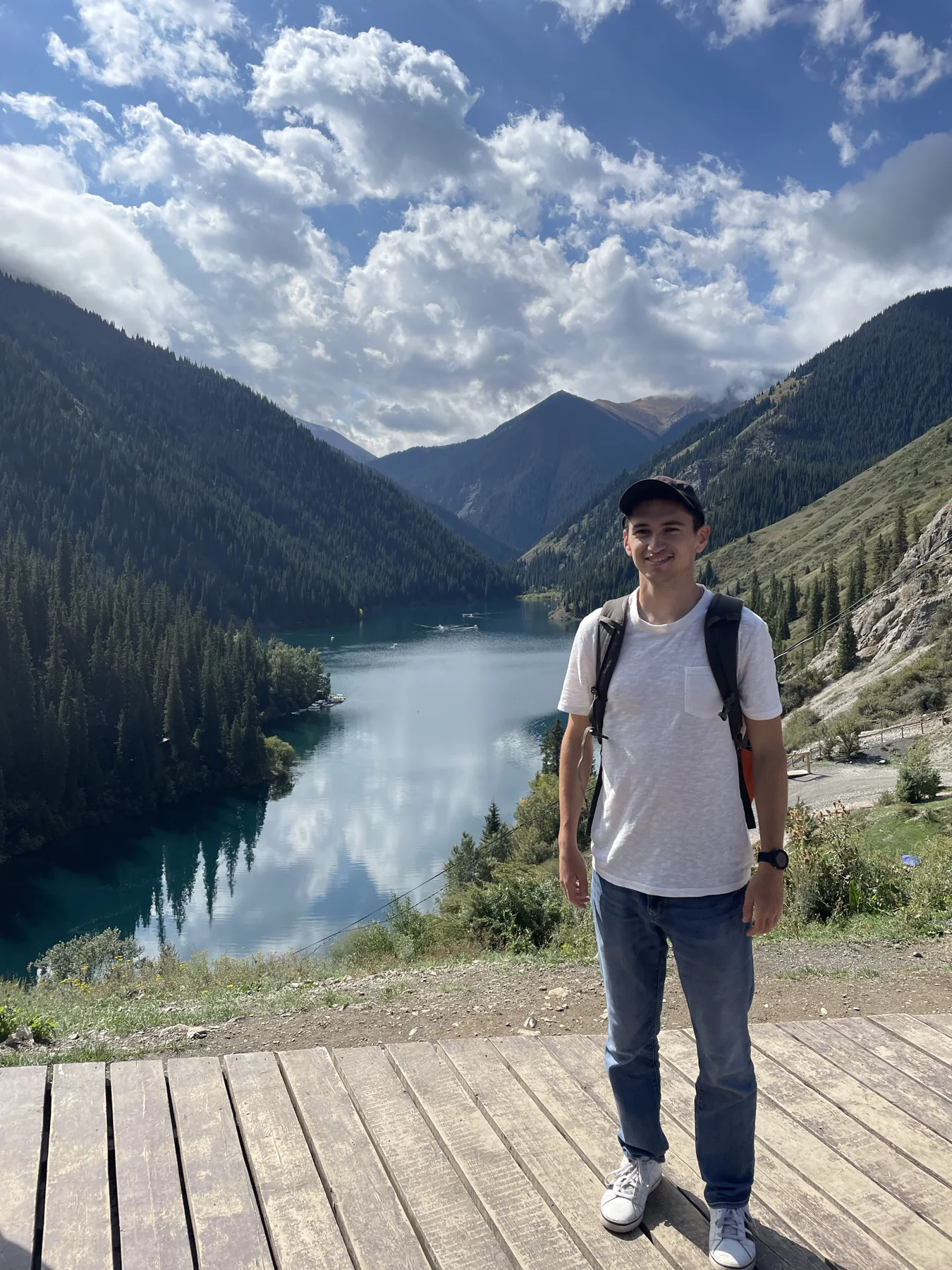 Jack overlooking a mountain lake in Kazakhstan